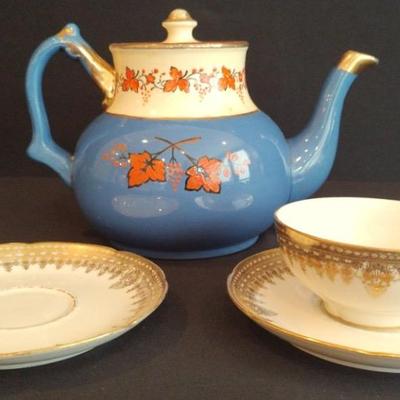 One Limoges Teacup, 2 Saucers & A (Possibly) Sadler Teapot