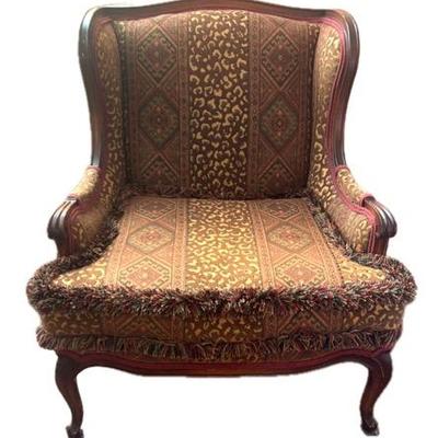 Queen Anne Style Upholstered Chair With Fringe Edge