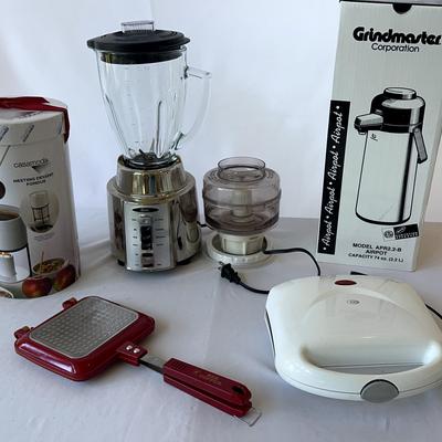 Fondue Set, Oster Blender, Grindmaster Airpot, Red Copper Flipwich & Durabrand Sanwich Maker