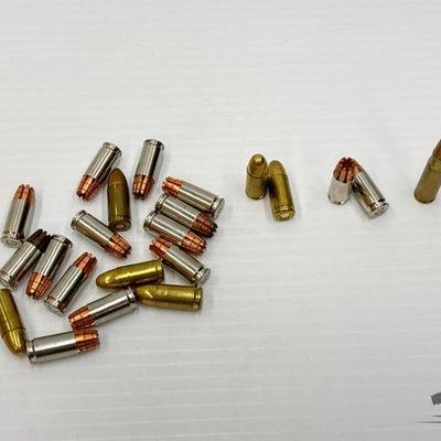 #706 • 21 Rounds of 9mm and 1 Round of 300 AAC Blackout Ammo
