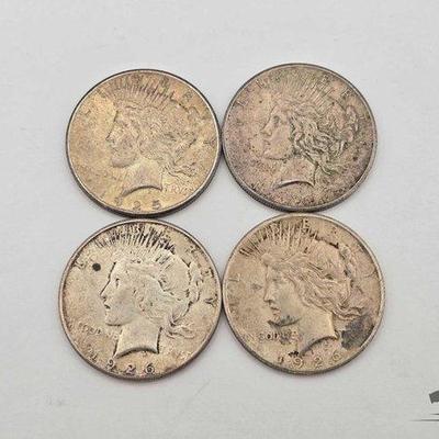 Sale Photo Thumbnail #77: #1350 • (4) 1925-1926 Silver Peace Dollars
