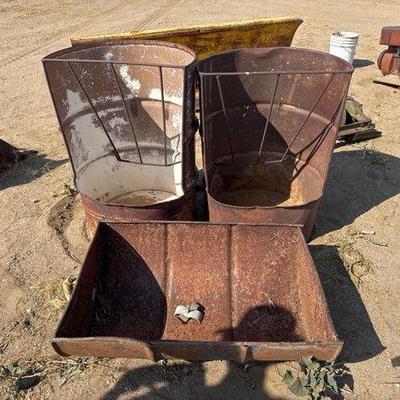 Sale Photo Thumbnail #291: #11006 • 2 Steel Barrel Feeders and Water Trough
