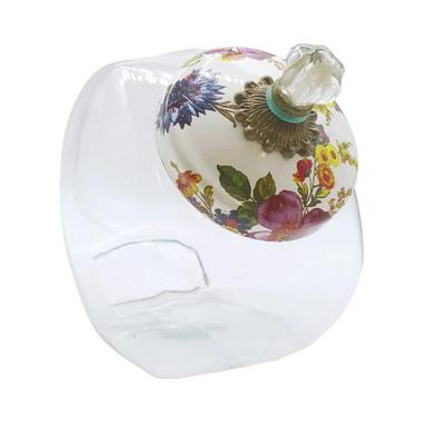 MacKenzie-Childs Flower Mart Cookie Jar. Clear Glass Body with Decorative Enamel Lid. Measures 8" x 9" x 6"