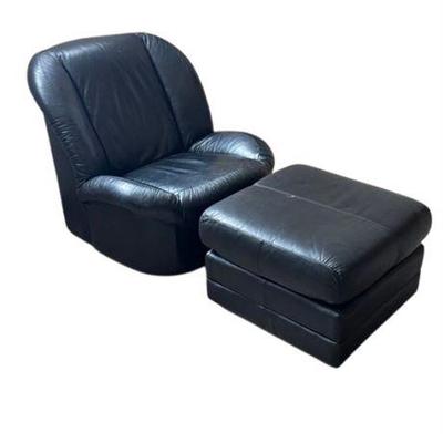 Lot 394 
Post Modern Black Leather Swivel Chair And Ottoman