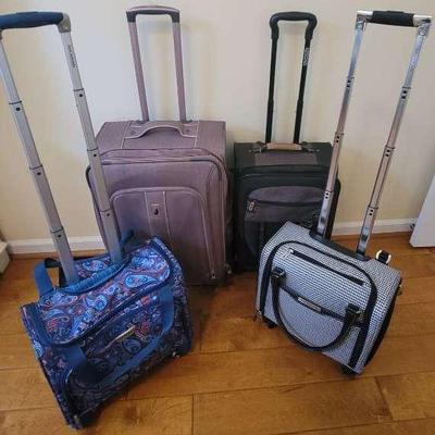 Four Rolling Suitcases Featuring London Fog