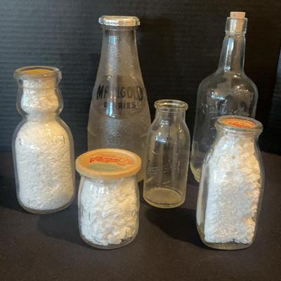 Clear Glass Milk, Orange Juice And Quaker Bottles