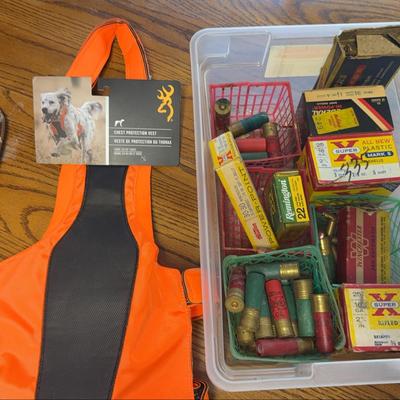 Mystery Lot of Ammo, a Buck Knife, & Hunting Dog Vest 