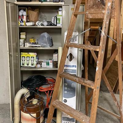 Cleanout With Metal Cabinet And Ladder