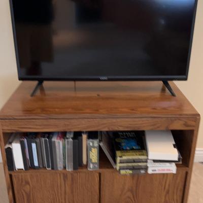 Vizio Television With Laminate Stand, Blank VHS Tapes And More