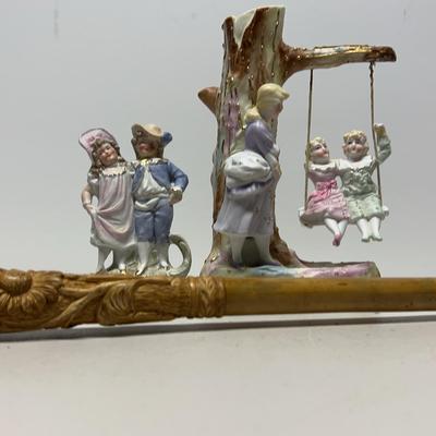 A Fine Victorian Carved Wood Parasol Handle Along With Victorian Bisque Figurines