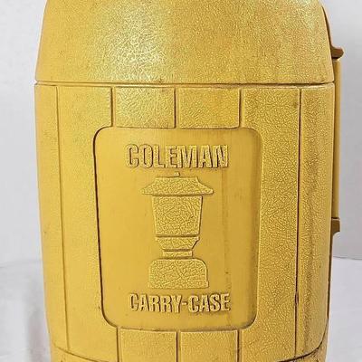 Vintage Coleman Model 275 lantern in its original yellow clamshell carrying case