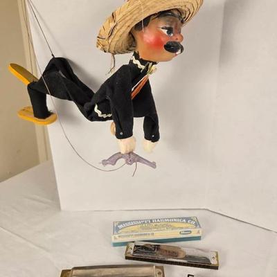 vintage Mexican marionette puppet and several harmonicas