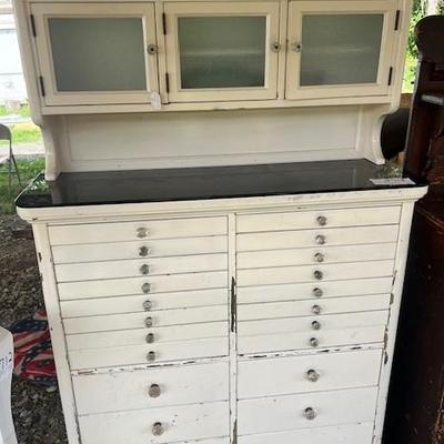 Sale Photo Thumbnail #1: Antique Dentist cabinet with milk glass trays inside smaller drawers 