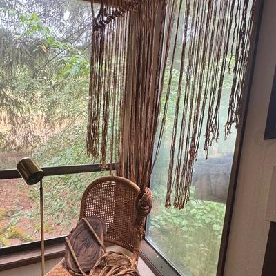 Decorative Wall Hanging, Plant Stand, Wicker Chair And Brass Floor Lamp