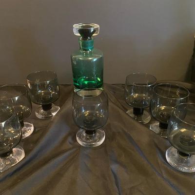 Green Decanter With 7 Black Stemmed Goblets