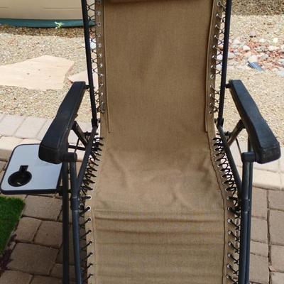 Reclining Outside Lounger With Small Side Table Attached 
