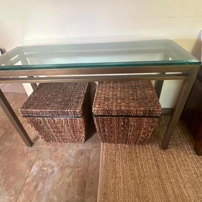 Glass console table & wicker storage ottomans
