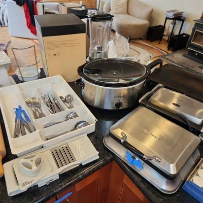 Cuisinart waffle maker, crockpot, flatware