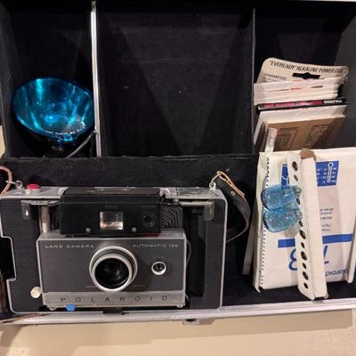 Sale Photo Thumbnail #53: Vintage Polaroid Automatic 100 Land Camera. Comes in case with manual  and accessories. 