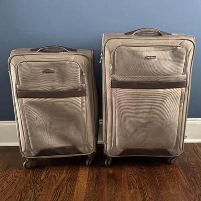Samsonite swivel suitcases large $40 and $30 fully functional good condition