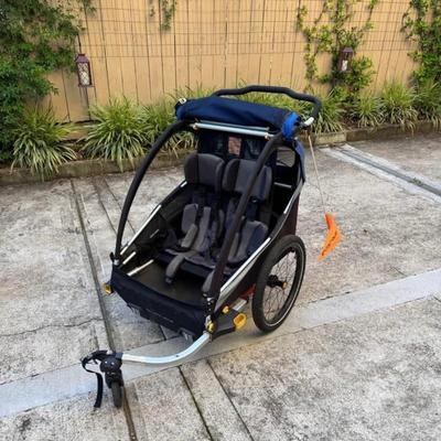 Sale Photo Thumbnail #17: Burley D’Lite bike trailer and double stroller convertible , $295, side windows missing available from manufacturers