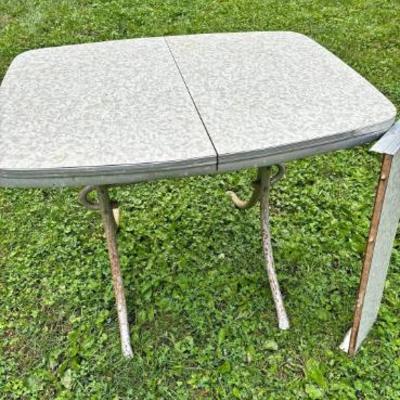 Table with leaf