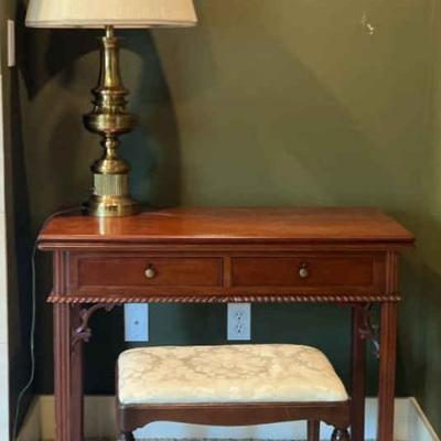 Writing table with stool and brass lamp
