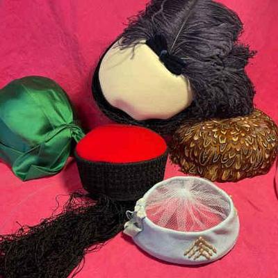 Collection of vintage women s hats in a hatbox