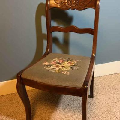 Solid wood chair with embroidered seat and carved backrest