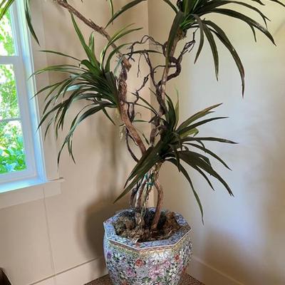 Large colorful asian pot with realistic artificial tree