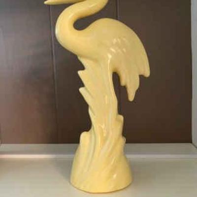 Yellow heron sculpture