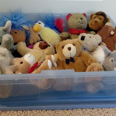 Bin of stuffed animals