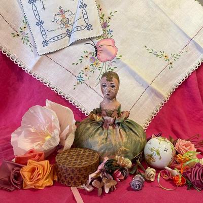 Floral antiques and pincushion doll