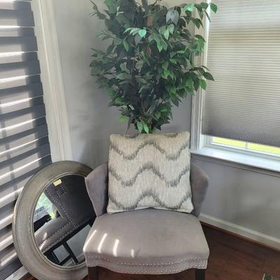 Chair, Mirror, And Faux Plant