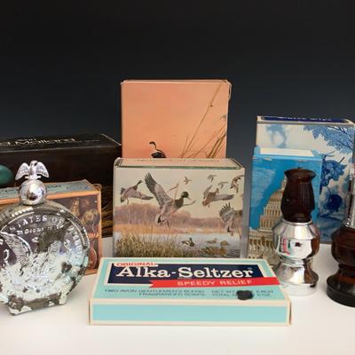 An Array Of Avon Colognes And Soaps