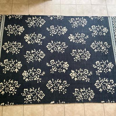 Navy And Cream Colored Knit Woven Rug 