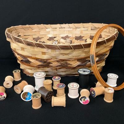 Basket Of Wooden Spools and An Embroidery Hoop