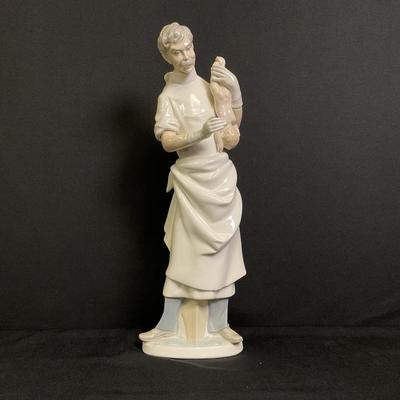 Lladro  4763 Doctor Holding Newborn