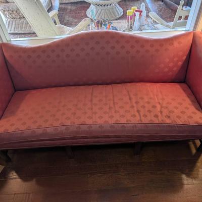 Upholstered Camel Back Sofa
