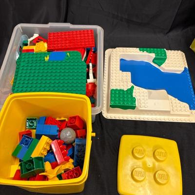 Lot 636: Vintage LEGO DUPLO Lot – Bulk Bricks, Baseplates & Yellow Storage Bin – Mixed Pieces