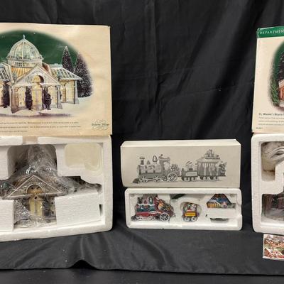 Lot 425: Department 56 Lot – Margrove Orangery, P.L. Wheeler’s Bicycle Shop, and Elf Express Train