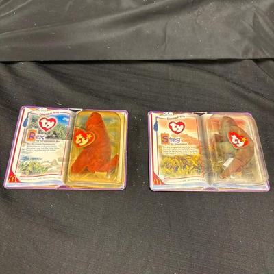 Lot 637: TY Beanie Babies McDonald’s Dino Trio – Rex & Steg in Original Packaging (1999)