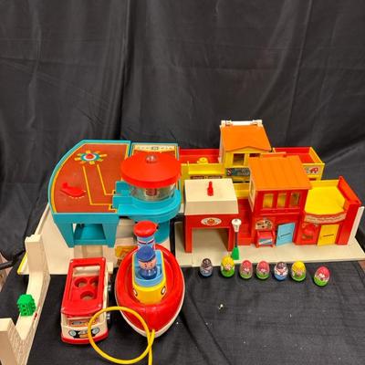 Lot 635: Vintage Fisher-Price Little People Lot – #930 Parking Garage, Puffer Puff Tugboat & Figures