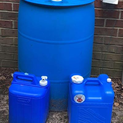 Plastic Barrel and 5-Gallon Water Containers
