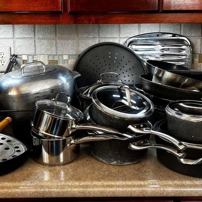 Extensive Cookware Collection Featuring Calphalon, Cast Iron & Belgique Elite
