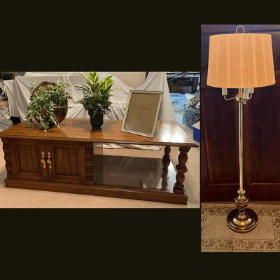 Coffee Table With Sliding Storage Door, Plant Centerpiece, And Picture Frame