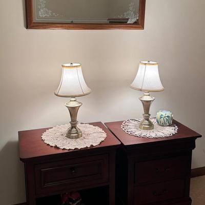 Two Nightstands With Lamps And Decor 