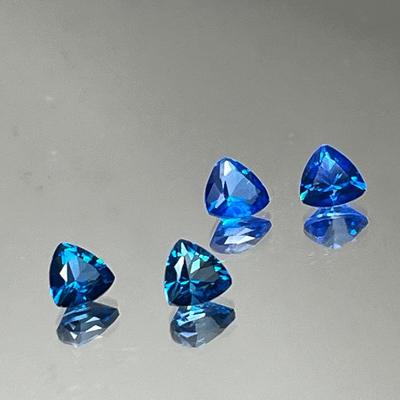 Treated Blue Topaz 1.85 CTTW and Treated Glacier Blue Topaz 1.85 CTTW 6x6mm Trillion Cuts