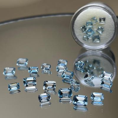 Topaz Emerald Cut 16.25 CTTW and Princess Cuts 3.75 CTTW