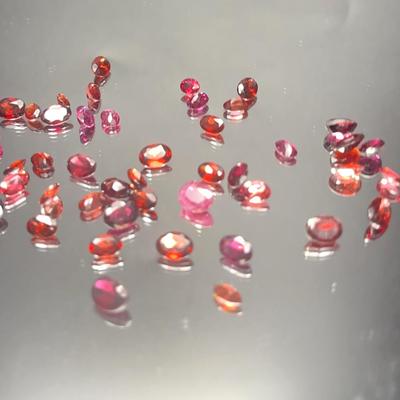 Garnet Ovals  33.4 CTTW, Up to 6x4mm - Brown To Red Color Variations